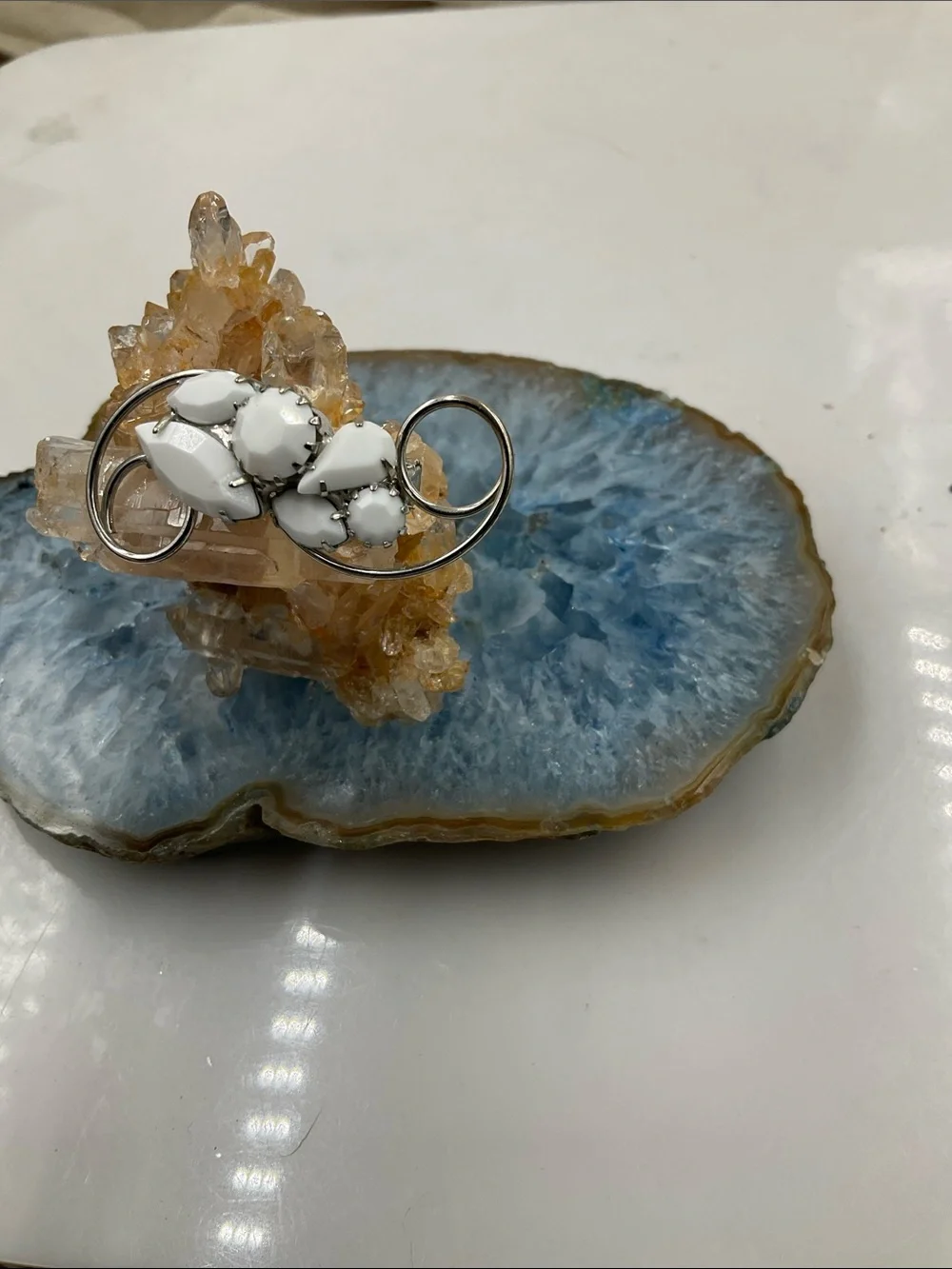 Vtg. White Milk Stone Silver Swirl Floral Brooch (2”Lx1”W)